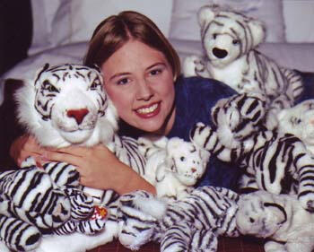 Dayanara with her childhood tiger collection